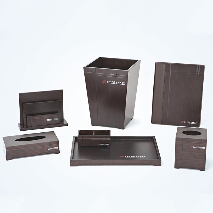 Galaxy Hospitality customizable executive guest room organizer set in dark faux wood grain finish showing customized hotel logos