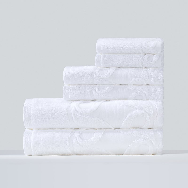 Galaxy Hospitality white luxury bath towels with custom high-low pile woven jacquard geometric wave patterns