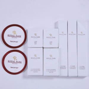 Galaxy Hospitality luxury white boxed guest room consumable collection with custom gold printed emblem and matching teacup mats for Royal Park Astana
