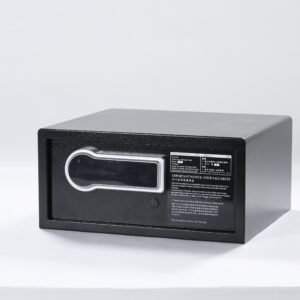 Black hotel in-room electronic safe box with a digital keypad and bilingual instruction panel