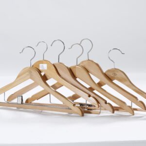 Premium natural wood hotel wardrobe hangers featuring elegant brand logos and adjustable metal clips