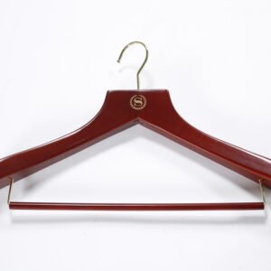 Luxury mahogany hotel logo wooden hangers featuring a custom printed gold emblem and a shiny gold metallic hook