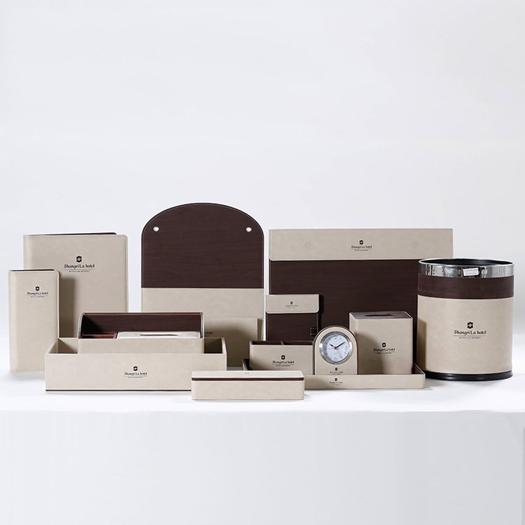 Galaxy Hospitality customizable guest room organizer sets in various textures and colors displaying luxury hotel brand logos