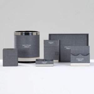 Galaxy Hospitality customizable executive guest room organizer set in textured charcoal grey faux leather with cream accents