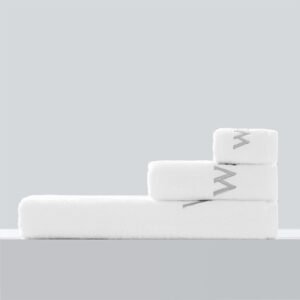 Galaxy Hospitality white luxury bath towels with custom dark grey hotel brand logo embroidery