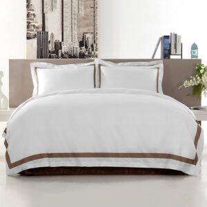 Luxury white hotel bedding set with elegant brown embroidered border trim