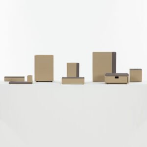 Galaxy Hospitality luxury customizable hotel room accessory set in sand beige faux leather with grey accent trims and debossed Marriott logos