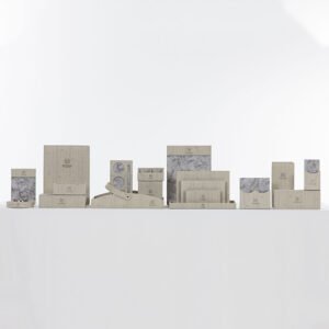 Galaxy Hospitality customizable Sheraton-style guest room organizer set in premium dark grey linen-textured leather with golden floral branding