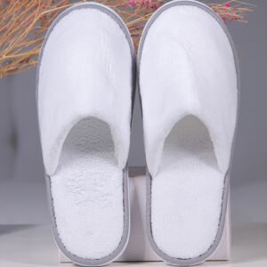Galaxy Hospitality luxury white closed-toe plush terry towel hotel slippers with high-grade gray piped borders