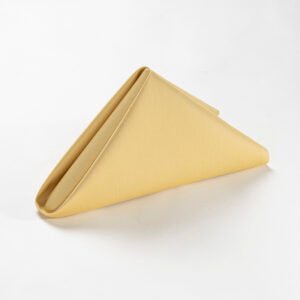 Folded golden yellow triangle wholesale gold cotton dinner napkins showing smooth premium cotton weave texture
