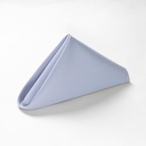Neatly folded slate grey blue triangle wholesale grey blue cotton pique napkins showing micro pique textured pattern