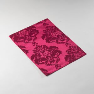 Magenta pink wholesale polyester damask floral jacquard placemats showing large peony motif and satin woven finish
