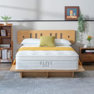 Pure white hotel euro top mattress set on a light oak wooden platform bed frame with yellow accent cushions