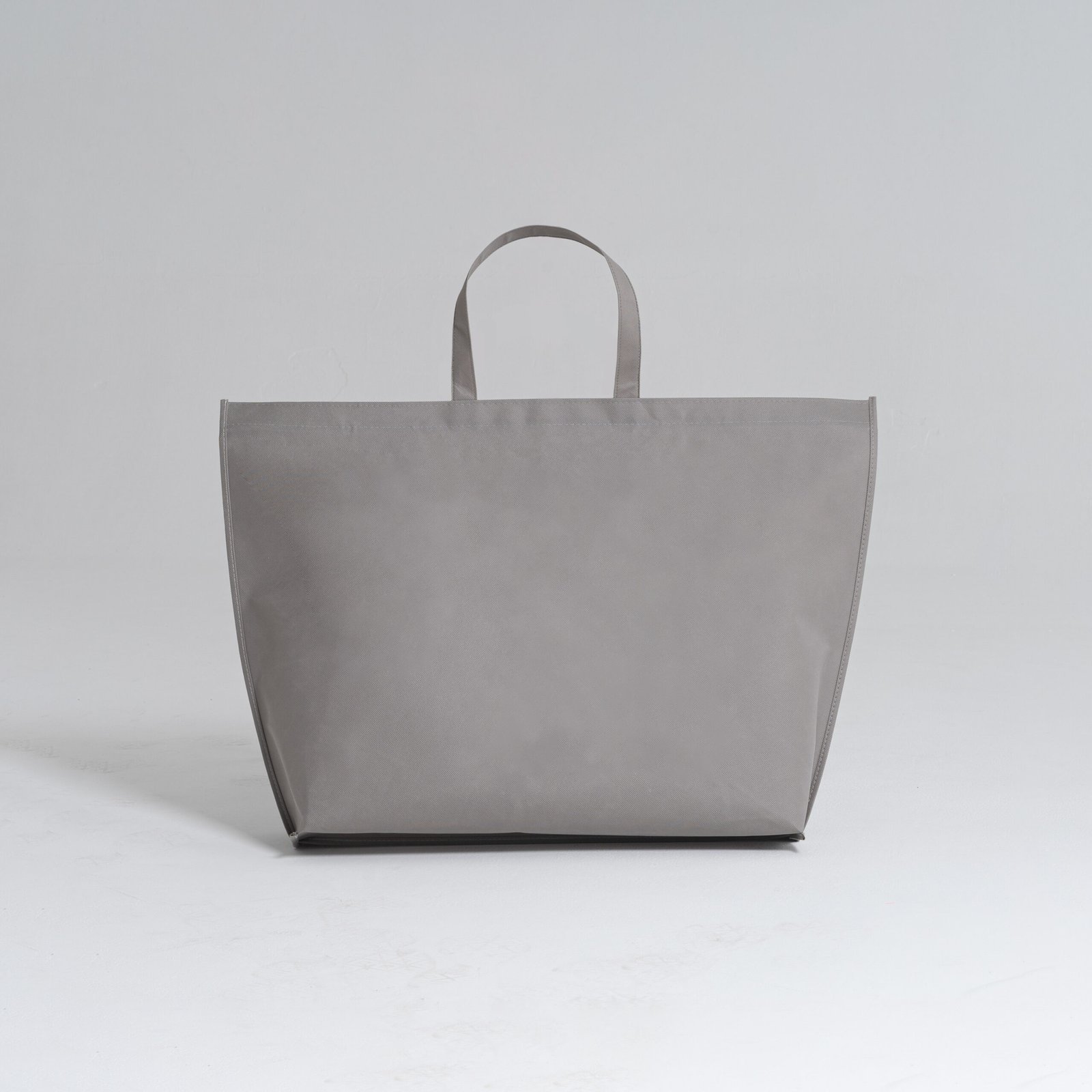 Minimalist Elegance: Custom Wholesale Zipper Flat Non Woven Grey Bag - Image 2