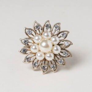Silver pearl flower napkin ring featuring a cluster of lustrous white pearls surrounded by rhinestone-encrusted petals