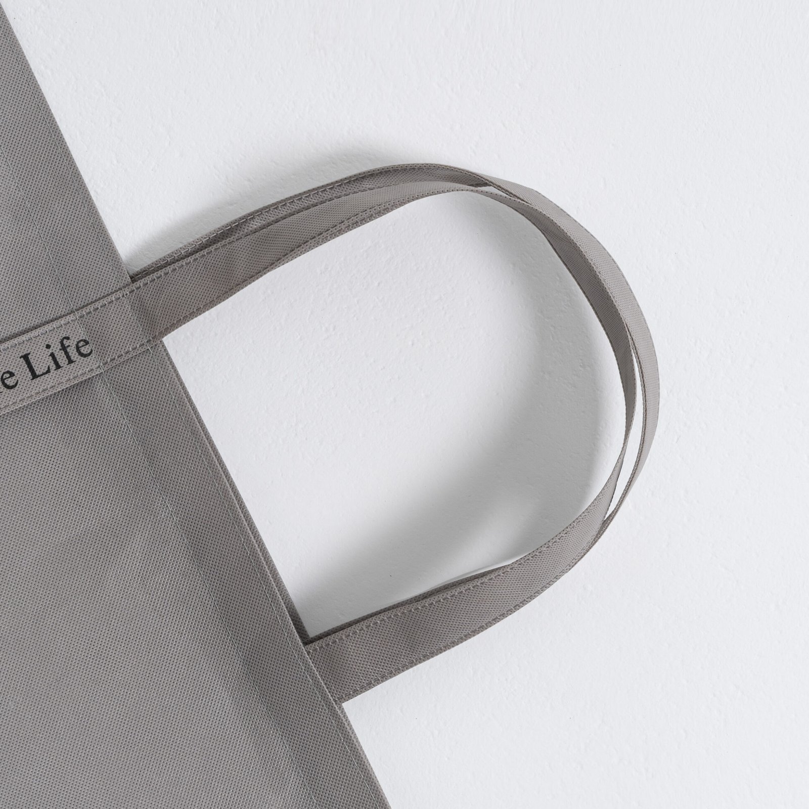 Minimalist Elegance: Custom Wholesale Zipper Flat Non Woven Grey Bag - Image 4