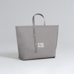 Zipper flat non woven grey bag with webbing handle and custom label for pillow packaging