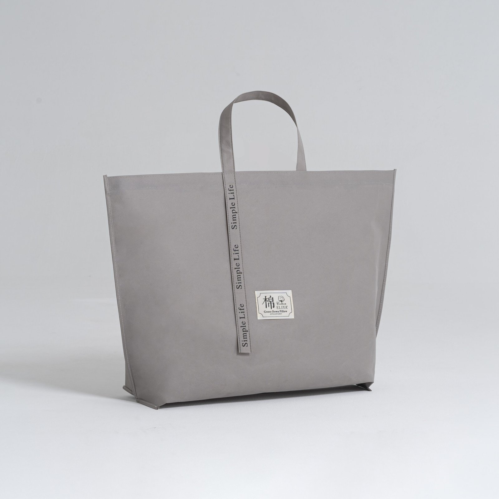 Zipper flat non woven grey bag with webbing handle and custom label for pillow packaging