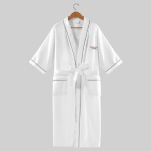 White waffle weave hotel bathrobe with 3/4 sleeves, contrast grey piping, and custom logo embroidery