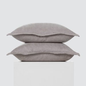 Slate grey waffle textured throw pillow cover with flange rim and matching tissue box cover