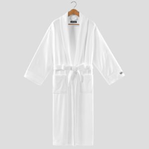 Plush white velour hotel bathrobe with shawl collar and Westin custom cuff embroidery